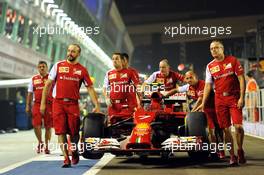 Ferrari F14-T of Fernando Alonso (ESP) Ferrari taken to scrutineering. 18.09.2014. Formula 1 World Championship, Rd 14, Singapore Grand Prix, Singapore, Singapore, Preparation Day.
