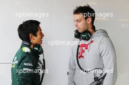 (L to R): Rio Haryanto (IDN) Caterham F1 Team Test Driver with Nathanael Berthon (FRA) Caterham F1 Team Development Driver. 08.07.2014. Formula One Testing, Silverstone, England, Tuesday.