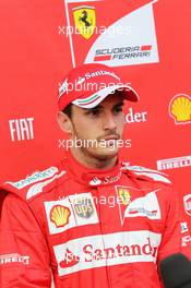Jules Bianchi (FRA) Ferrari Test Driver with the media. 09.07.2014. Formula One Testing, Silverstone, England, Wednesday.