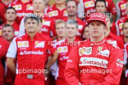 Kimi Raikkonen (FIN) Ferrari at a team photograph. 21.11.2014. Formula 1 World Championship, Rd 19, Abu Dhabi Grand Prix, Yas Marina Circuit, Abu Dhabi, Practice Day.