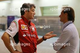 (L to R): Marco Mattiacci (ITA) Ferrari Team Principal with Dany Bahar (TUR). 21.11.2014. Formula 1 World Championship, Rd 19, Abu Dhabi Grand Prix, Yas Marina Circuit, Abu Dhabi, Practice Day.