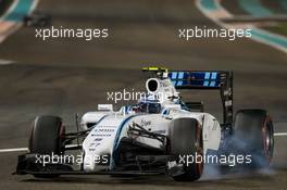 Valtteri Bottas (FIN) Williams FW36 locks up under braking. 21.11.2014. Formula 1 World Championship, Rd 19, Abu Dhabi Grand Prix, Yas Marina Circuit, Abu Dhabi, Practice Day.