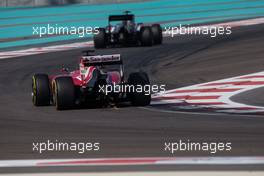 Fernando Alonso (ESP) Ferrari F14-T sends sparks flying. 21.11.2014. Formula 1 World Championship, Rd 19, Abu Dhabi Grand Prix, Yas Marina Circuit, Abu Dhabi, Practice Day.