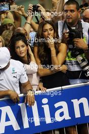 Nicole Scherzinger (USA) Singer, girlfriend of Lewis Hamilton (GBR) Mercedes AMG F1, at parc ferme. 23.11.2014. Formula 1 World Championship, Rd 19, Abu Dhabi Grand Prix, Yas Marina Circuit, Abu Dhabi, Race Day.
