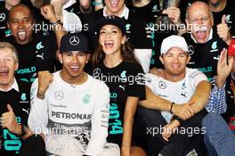 Race winner and World Champion Lewis Hamilton (GBR) Mercedes AMG F1 celebrates with girlfriend Nicole Scherzinger (USA) Singer; team mate Nico Rosberg (GER) Mercedes AMG F1 and the team. 23.11.2014. Formula 1 World Championship, Rd 19, Abu Dhabi Grand Prix, Yas Marina Circuit, Abu Dhabi, Race Day.