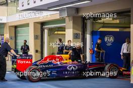 The Red Bull Racing RB10 of Sebastian Vettel (GER) Red Bull Racing is sent to scrutineering. 22.11.2014. Formula 1 World Championship, Rd 19, Abu Dhabi Grand Prix, Yas Marina Circuit, Abu Dhabi, Qualifying Day.