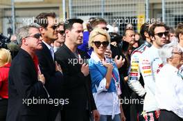  Keanu Reeves (USA) Actor and Pamela Anderson (USA) Actress on the grid. 02.11.2014. Formula 1 World Championship, Rd 17, United States Grand Prix, Austin, Texas, USA, Race Day.