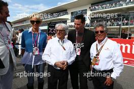 (L to R): Simon Le Bon (GBR) Duran Duran Lead Singer with Pamela Anderson (USA) Actress; Bernie Ecclestone (GBR); Keanu Reeves (USA) Actor; and Mario Andretti (USA) Circuit of The Americas' Official Ambassador. 02.11.2014. Formula 1 World Championship, Rd 17, United States Grand Prix, Austin, Texas, USA, Race Day.