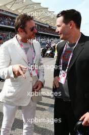 (L to R): Simon Le Bon (GBR) Duran Duran Lead Singer with  Keanu Reeves (USA) Actor on the grid. 02.11.2014. Formula 1 World Championship, Rd 17, United States Grand Prix, Austin, Texas, USA, Race Day.