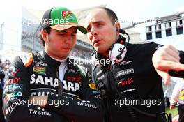 (L to R): Sergio Perez (MEX) Sahara Force India F1 with Gianpiero Lambiase (ITA) Sahara Force India F1 Engineer on the grid. 02.11.2014. Formula 1 World Championship, Rd 17, United States Grand Prix, Austin, Texas, USA, Race Day.
