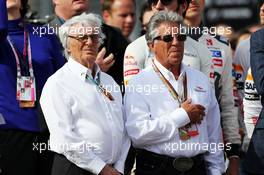 (L to R): Bernie Ecclestone (GBR) with Mario Andretti (USA) Circuit of The Americas' Official Ambassador on the grid. 02.11.2014. Formula 1 World Championship, Rd 17, United States Grand Prix, Austin, Texas, USA, Race Day.