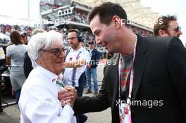 (L to R): Bernie Ecclestone (GBR) with  Keanu Reeves (USA) Actor on the grid. 02.11.2014. Formula 1 World Championship, Rd 17, United States Grand Prix, Austin, Texas, USA, Race Day.