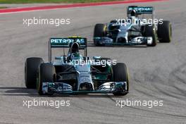 Nico Rosberg (GER) Mercedes AMG F1 W05 leads team mate Lewis Hamilton (GBR) Mercedes AMG F1 W05. 02.11.2014. Formula 1 World Championship, Rd 17, United States Grand Prix, Austin, Texas, USA, Race Day.