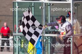 The chequered flag is waved at the end of the race 02.11.2014. Formula 1 World Championship, Rd 17, United States Grand Prix, Austin, Texas, USA, Race Day.