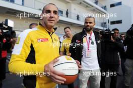 (L to R): Cyril Abiteboul (FRA) Renault Sport F1 Managing Director with Tony Parker (FRA) NBA Basketball Player. 01.11.2014. Formula 1 World Championship, Rd 17, United States Grand Prix, Austin, Texas, USA, Qualifying Day.