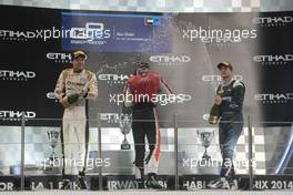 Race 1, 1st position Stoffel Vandoorne (BEL) Art Grand Prix, 2nd position Jolyon Palmer (GBR) Dams and 3rd position Mitch Evans (NZL) RT Russian Time 22.11.2014. GP2 Series, Rd 11, Yas Marina Circuit, Abu Dhabi, UAE, Saturday.