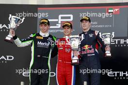 Podium, Race 2, 2nd Nick Yelloly (GBR) Status Grand Prix, 1st Patric Niederhauser (SUI) Arden International, 3rd Alex Lynn (GBR) Carlin 23.11.2014. GP3 Series, Rd 9, Yas Marina Circuit, Abu Dhabi, UAE, Sunday.