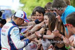 Stephane Sarrazin (FRA) #07 Toyota Racing Toyota TS040 Hybrid signs autographs for the fans. 13.06.2014. FIA World Endurance Championship Le Mans 24 Hours, Race, Le Mans, France. Friday.