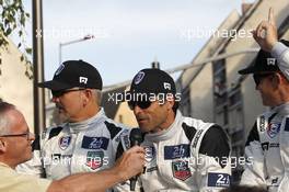 Patrick Dempsey (USA) / Joe Foster (USA) / Patrick Long (USA) #77 Dempsey Racing Proton Porsche 911 RSR (991) 13.06.2014. Le Mans 24 Hour, Le Mans, Street Parade, France.