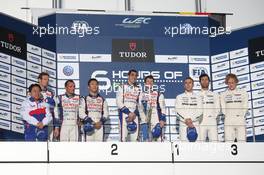 The podium (L to R): Alexander Wurz (AUT) / Stephane Sarrazin (FRA) / Kazuki Nakajima (JPN) #07 Toyota Racing Toyota TS040 Hybrid, second; Sebastien Buemi (SUI) / Anthony Davidson (GBR) #08 Toyota Racing Toyota TS040 Hybrid, race winners; Timo Bernhard (GER) / Mark Webber (AUS) / Brendon Hartley (NZL) #20 Porsche Team Porsche 919 Hybrid, third. 12.10.2014. FIA World Endurance Championship, Round 5, Six Hours of Fuji, Fuji, Japan, Sunday.