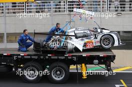 The #20 Porsche Team Porsche 919 Hybrid is recovered back to the pits on the back of a truck after Mark Webber (AUS) crashed out of the race. 30.11.2014. FIA World Endurance Championship, Round 8, Six Hours of Sao Paulo, Interlagos, Sao Paulo, Brazil. Sunday.