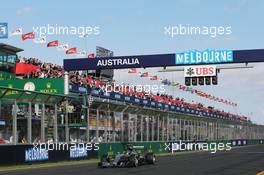 Second placed Nico Rosberg (GER) Mercedes AMG F1 W06 takes the chequered flag at the end of the race. 15.03.2015. Formula 1 World Championship, Rd 1, Australian Grand Prix, Albert Park, Melbourne, Australia, Race Day.