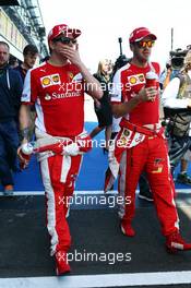 (L to R): Kimi Raikkonen (FIN) Ferrari with Sebastian Vettel (GER) Ferrari. 15.03.2015. Formula 1 World Championship, Rd 1, Australian Grand Prix, Albert Park, Melbourne, Australia, Race Day.
