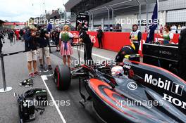 Jenson Button (GBR) McLaren MP4-30 on the grid. 21.06.2015. Formula 1 World Championship, Rd 8, Austrian Grand Prix, Spielberg, Austria, Race Day.