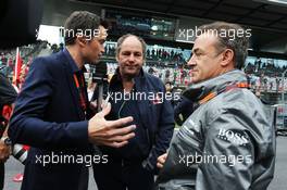 Gerhard Berger (AUT) (Centre) and Jean Alesi (FRA) (Right) on the grid. 21.06.2015. Formula 1 World Championship, Rd 8, Austrian Grand Prix, Spielberg, Austria, Race Day.