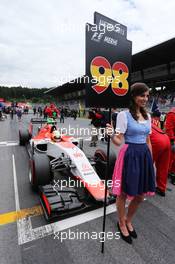 Grid girl for Roberto Merhi (ESP) Manor Marussia F1 Team. 21.06.2015. Formula 1 World Championship, Rd 8, Austrian Grand Prix, Spielberg, Austria, Race Day.