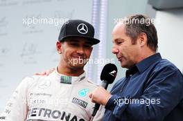 (L to R): Lewis Hamilton (GBR) Mercedes AMG F1 on the podium with Gerhard Berger (AUT). 21.06.2015. Formula 1 World Championship, Rd 8, Austrian Grand Prix, Spielberg, Austria, Race Day.