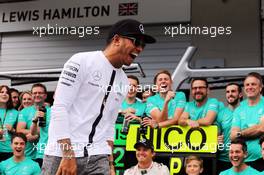 Lewis Hamilton (GBR) Mercedes AMG F1 celebrates with the team. 21.06.2015. Formula 1 World Championship, Rd 8, Austrian Grand Prix, Spielberg, Austria, Race Day.