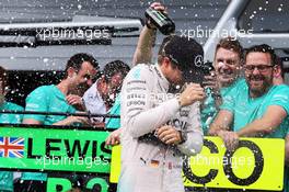 Race winner Nico Rosberg (GER) Mercedes AMG F1 celebrates with the team. 21.06.2015. Formula 1 World Championship, Rd 8, Austrian Grand Prix, Spielberg, Austria, Race Day.