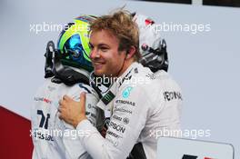 Race winner Nico Rosberg (GER) Mercedes AMG F1 celebrates with team mate Lewis Hamilton (GBR) Mercedes AMG F1 and Felipe Massa (BRA) Williams in parc ferme. 21.06.2015. Formula 1 World Championship, Rd 8, Austrian Grand Prix, Spielberg, Austria, Race Day.