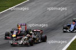 Pastor Maldonado (VEN) Lotus F1 E23 and Daniil Kvyat (RUS) Red Bull Racing RB11 battle for position. 21.06.2015. Formula 1 World Championship, Rd 8, Austrian Grand Prix, Spielberg, Austria, Race Day.