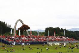 Fans in the grandstand. 21.06.2015. Formula 1 World Championship, Rd 8, Austrian Grand Prix, Spielberg, Austria, Race Day.