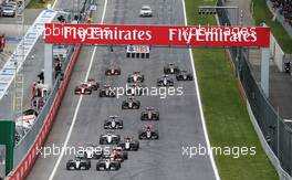 (L to R): Nico Rosberg (GER) Mercedes AMG F1 W06 and team mate Lewis Hamilton (GBR) Mercedes AMG F1 W06 battle for the lead at the start of the race. 21.06.2015. Formula 1 World Championship, Rd 8, Austrian Grand Prix, Spielberg, Austria, Race Day.