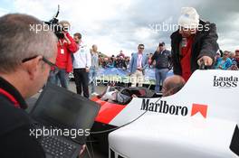 Niki Lauda (AUT) Mercedes Non-Executive Chairman with the McLaren MP4/2 at the Legends Parade. 20.06.2015. Formula 1 World Championship, Rd 8, Austrian Grand Prix, Spielberg, Austria, Qualifying Day.