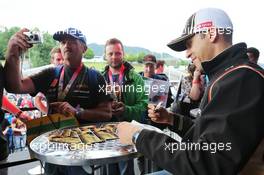 Pastor Maldonado (VEN) Lotus F1 Team signs autographs for the fans. 18.06.2015. Formula 1 World Championship, Rd 8, Austrian Grand Prix, Spielberg, Austria, Preparation Day.