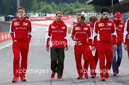 Sebastian Vettel (GER) Ferrari walks the circuit. 18.06.2015. Formula 1 World Championship, Rd 8, Austrian Grand Prix, Spielberg, Austria, Preparation Day.