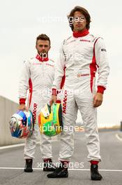 Roberto Merhi (ESP) Manor Marussia F1 Team (Right) with team mate Will Stevens (GBR) Manor Marussia F1 Team (Left). 18.06.2015. Formula 1 World Championship, Rd 8, Austrian Grand Prix, Spielberg, Austria, Preparation Day.