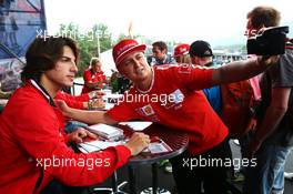 Roberto Merhi (ESP) Manor Marussia F1 Team with fans. 18.06.2015. Formula 1 World Championship, Rd 8, Austrian Grand Prix, Spielberg, Austria, Preparation Day.