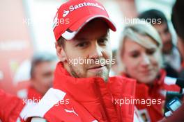 Sebastian Vettel (GER) Ferrari with the media. 27.02.2015. Formula One Testing, Day Two, Barcelona, Spain.