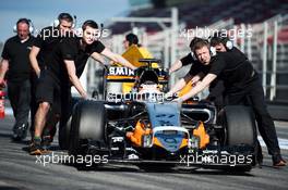 Nico Hulkenberg (GER) Sahara Force India F1 VJM08 is pushed down the pit lane by mechanics. 27.02.2015. Formula One Testing, Day Two, Barcelona, Spain.