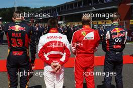 (L to R): Max Verstappen (NLD) Scuderia Toro Rosso; Will Stevens (GBR) Manor Marussia F1 Team; Kimi Raikkonen (FIN) Ferrari; and Daniil Kvyat (RUS) Red Bull Racing as the grid observes the national anthem. 23.08.2015. Formula 1 World Championship, Rd 13, Belgian Grand Prix, Spa Francorchamps, Belgium, Race Day.