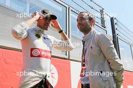 (L to R): Pastor Maldonado (VEN) Lotus F1 Team on the grid with Nicolas Todt (FRA) Driver Manager. 23.08.2015. Formula 1 World Championship, Rd 13, Belgian Grand Prix, Spa Francorchamps, Belgium, Race Day.