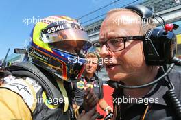 (L to R): Pastor Maldonado (VEN) Lotus F1 Team on the grid with Mark Slade (GBR) Lotus F1 Team Race Engineer. 23.08.2015. Formula 1 World Championship, Rd 13, Belgian Grand Prix, Spa Francorchamps, Belgium, Race Day.