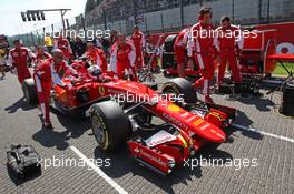 Sebastian Vettel (GER) Ferrari SF15-T on the grid. 23.08.2015. Formula 1 World Championship, Rd 13, Belgian Grand Prix, Spa Francorchamps, Belgium, Race Day.