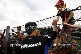 Lewis Hamilton (GBR) Mercedes AMG F1 with the fans. 23.08.2015. Formula 1 World Championship, Rd 13, Belgian Grand Prix, Spa Francorchamps, Belgium, Race Day.