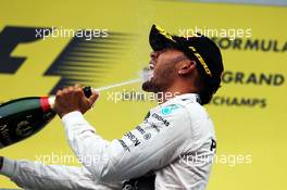 Race winner Lewis Hamilton (GBR) Mercedes AMG F1 celebrates on the podium. 23.08.2015. Formula 1 World Championship, Rd 13, Belgian Grand Prix, Spa Francorchamps, Belgium, Race Day.